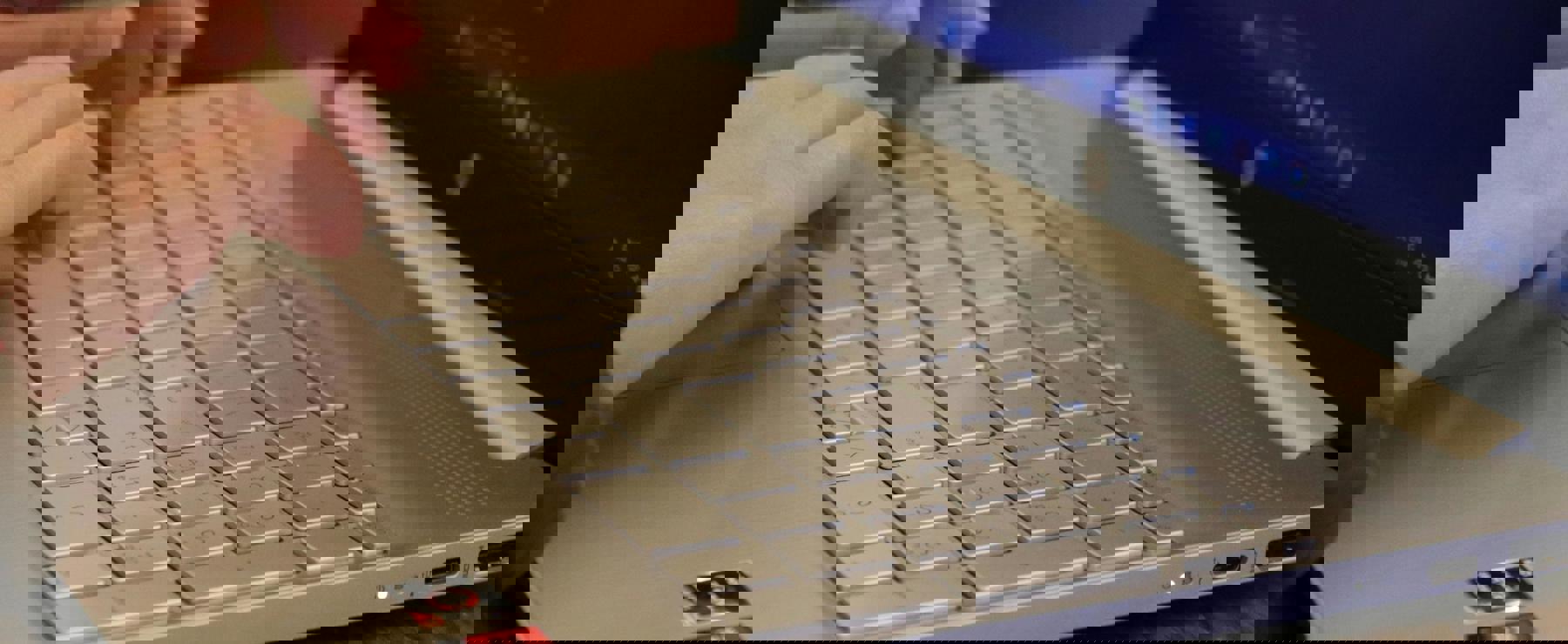 Typing On A Laptop Alain Youssef